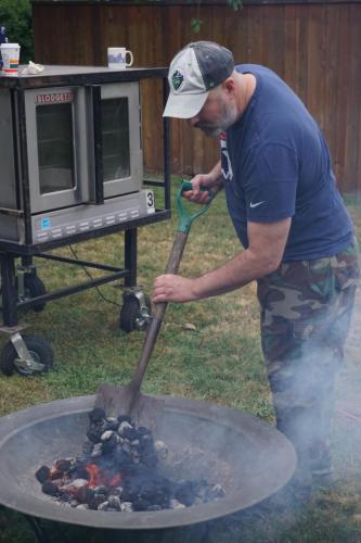 Stoking the coals.